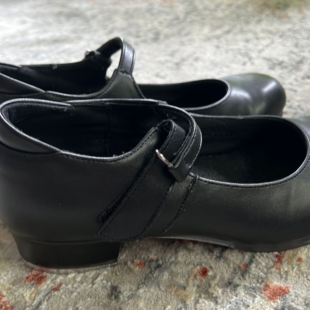 Black tap shoes. Size seven.